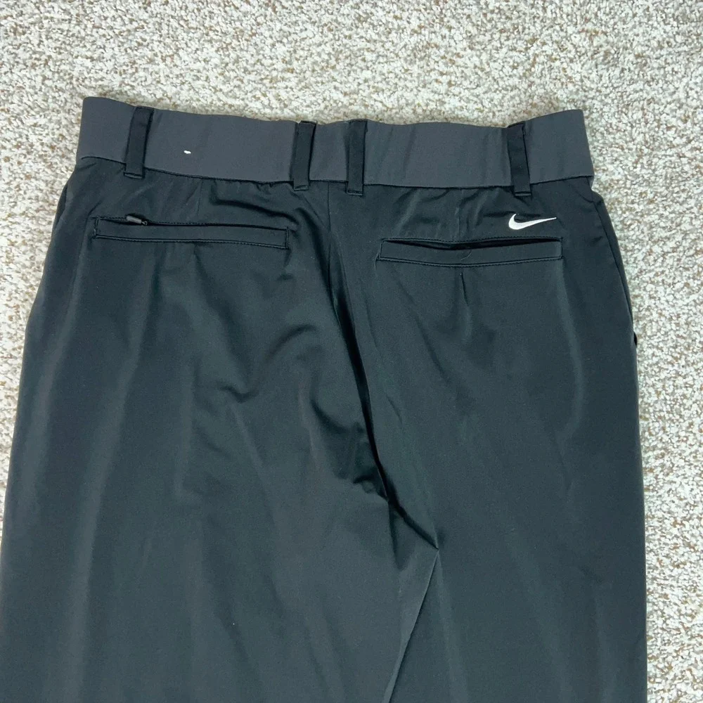 Nike Pants Womens Large Black Comfort Dri-FIT Golf Tapered Stretch Trousers Logo